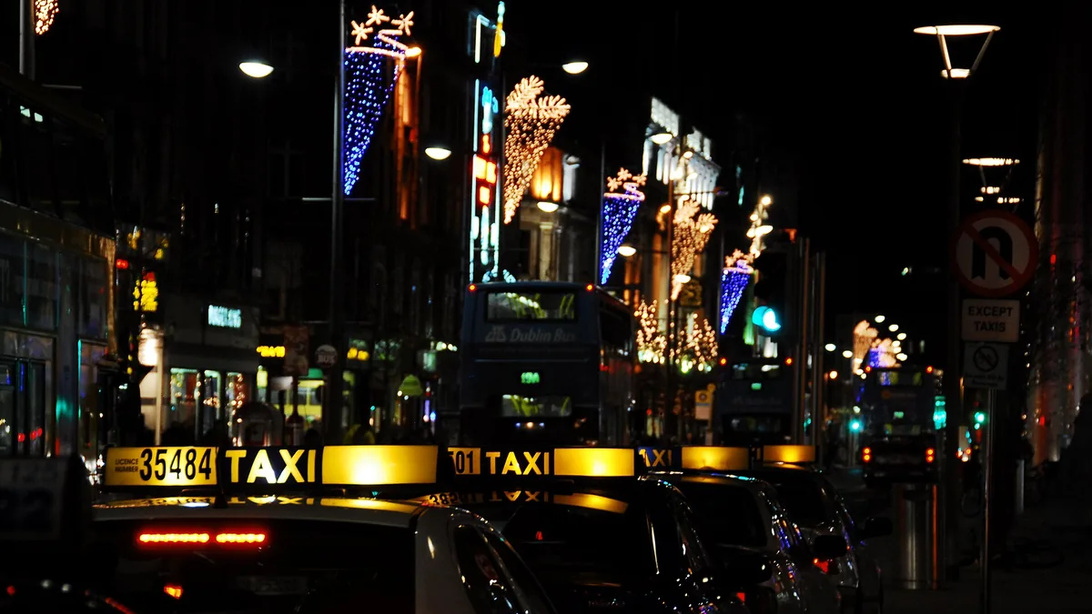 Taxis on O'Connell Street in Dublin. Photograph by Tinou Bao, CC BY 2.0.