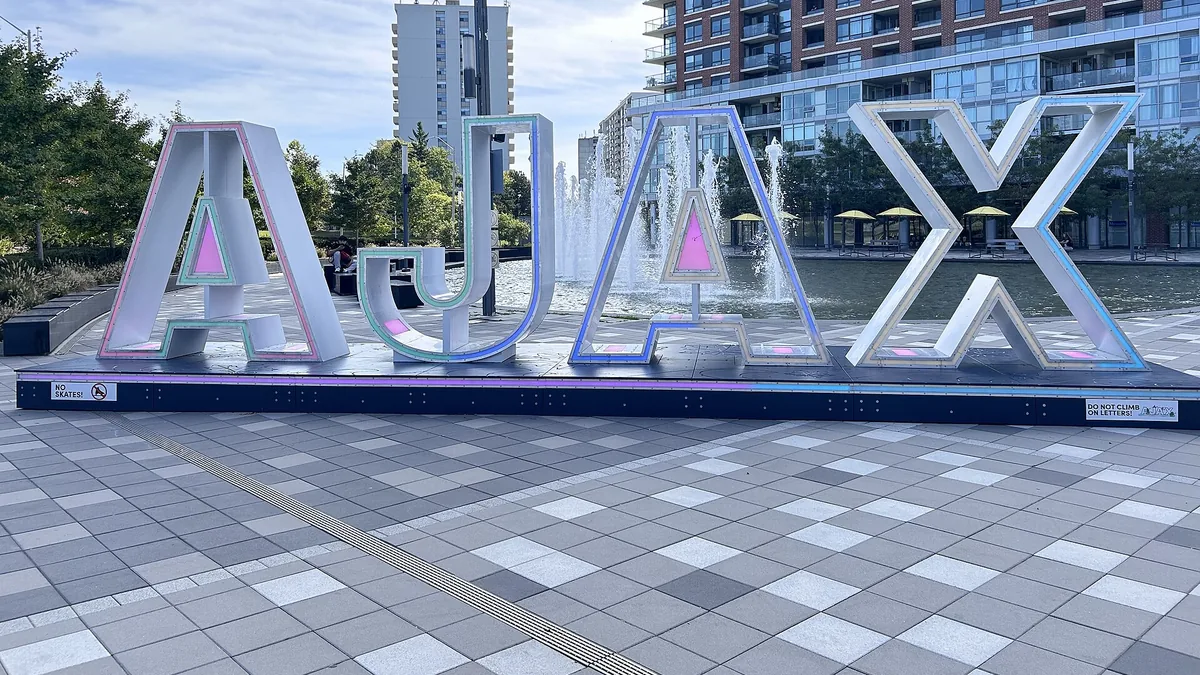 The AJAX sign in Ajax, Ontario. Photograph by FaysaLBinDaruL, CC BY 4.0.