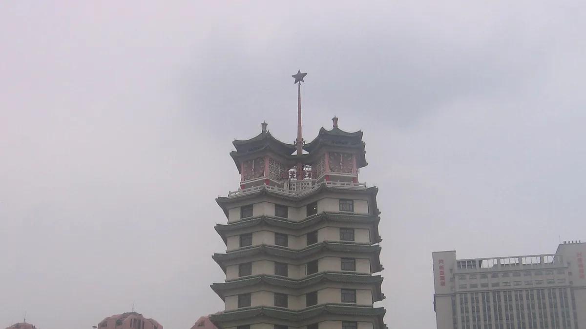 The February Seventh Memorial Tower in Zhengzhou. Photograph by Zhou Guanhuai, CC0.