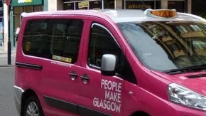 A pink People Make Glasgow taxi. Photograph by Thomas Nugent, CC BY-SA 2.0.