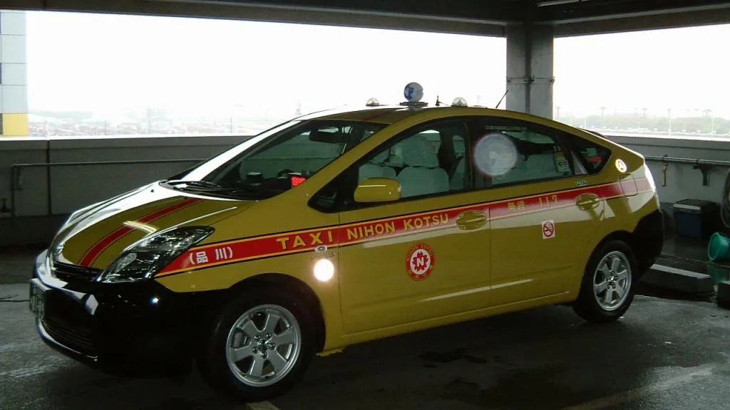 A yellow Nihon Kotsu taxi. Photograph by Nomuta, CC BY 3.0.