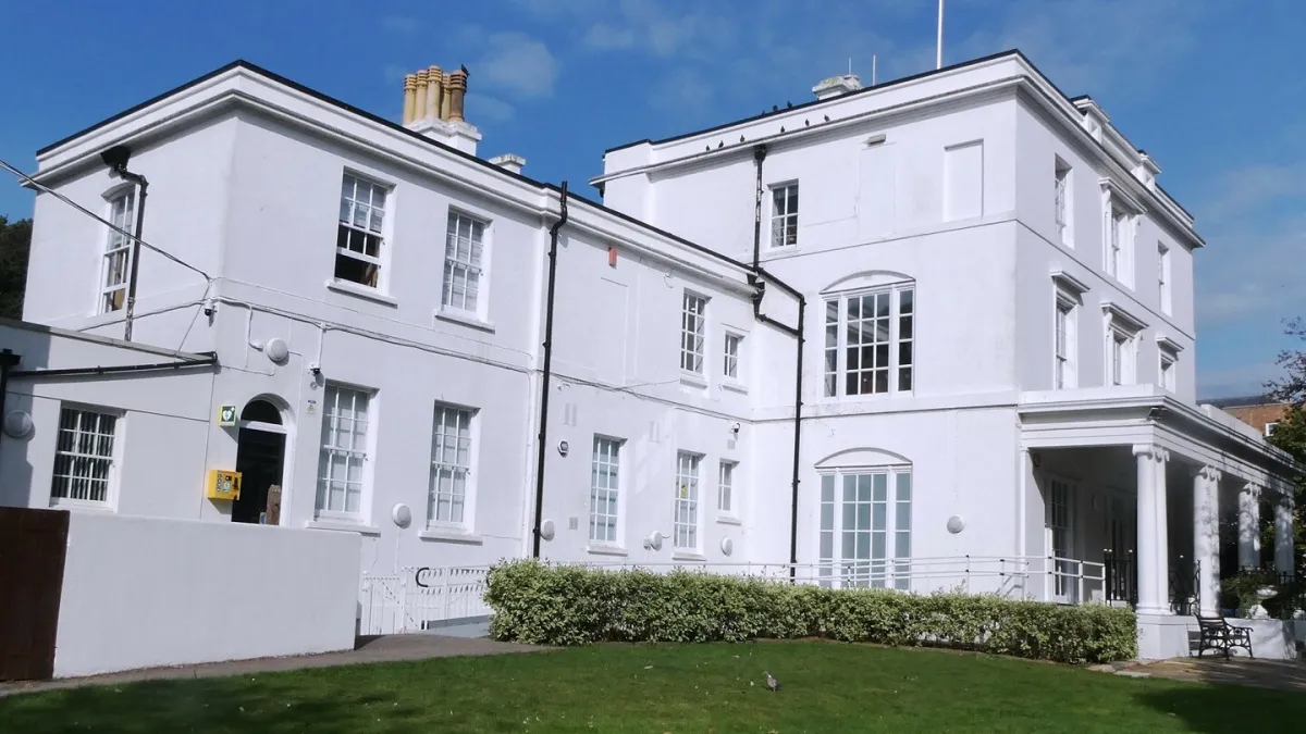 Pierremont Hall, a white building in Broadstairs flying a Union flag. The Crofts Place toilets are not in the picture.