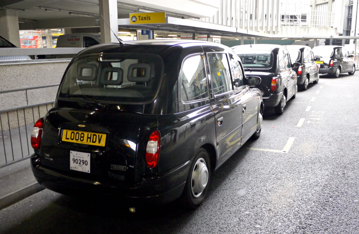 Black cabs on the taxi rank at Heathrow