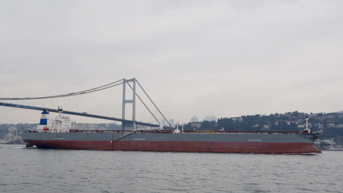 Crude oil tanker passing under a bridge on the Bosphorus